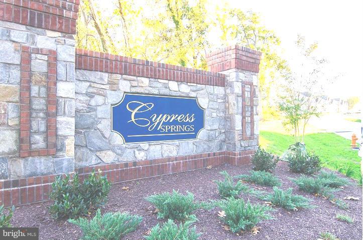 5920 Cypress Springs Road Elkridge, MD 21075 - Photo 28 of 28 a sign on the side of a building
