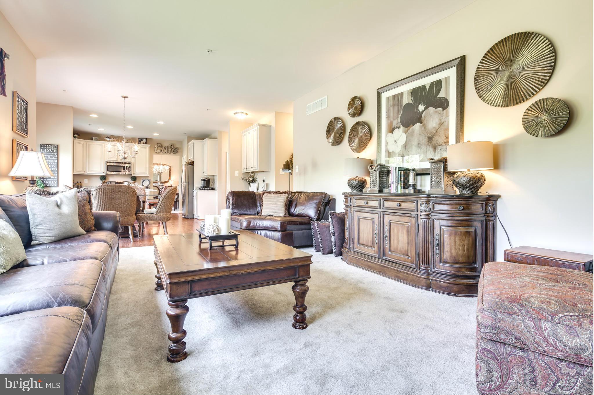 5920 Cypress Springs Road Elkridge, MD 21075 - Photo 6 of 28 a living room with furniture and wooden floor