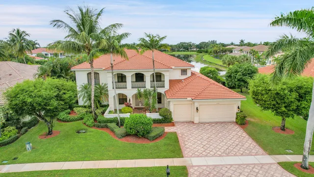 an aerial view of house with yard