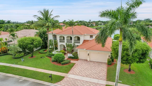 an aerial view of a houses with outdoor space and street view