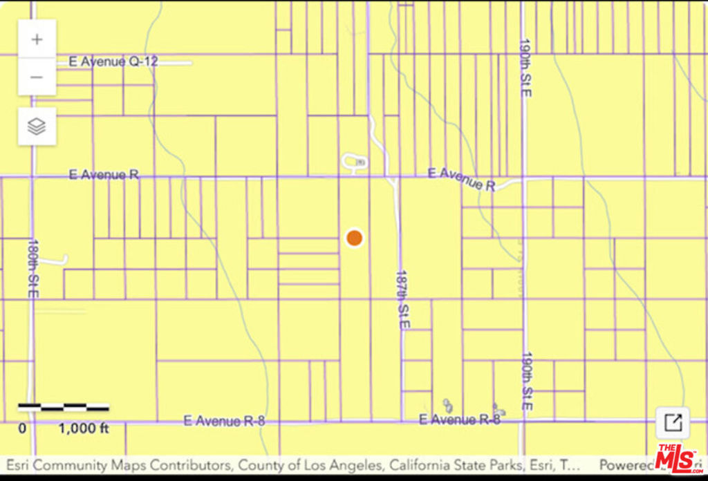 186-th Str East Avenue R Llano, CA 93544 - Photo 3 of 3 a picture of a bathroom with a shower curtain