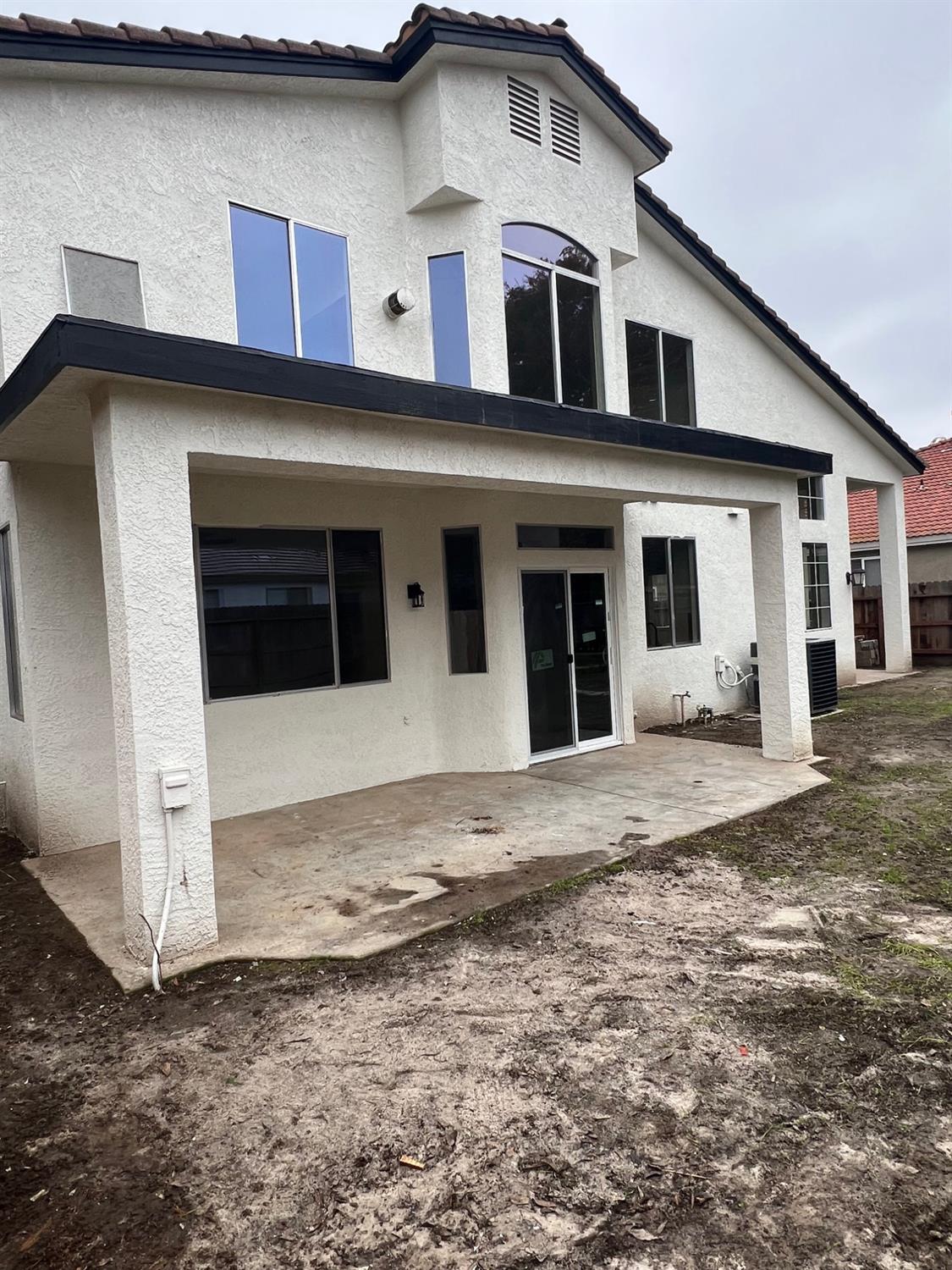 5930 West Birch Avenue Fresno, CA 93722 - Photo 30 of 32 a view of a white house