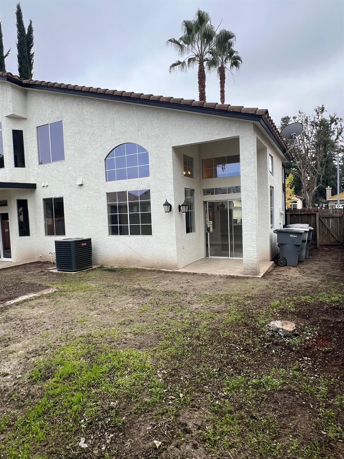5930 West Birch Avenue Fresno, CA 93722 - Photo 31 of 32 a house view with a garden space