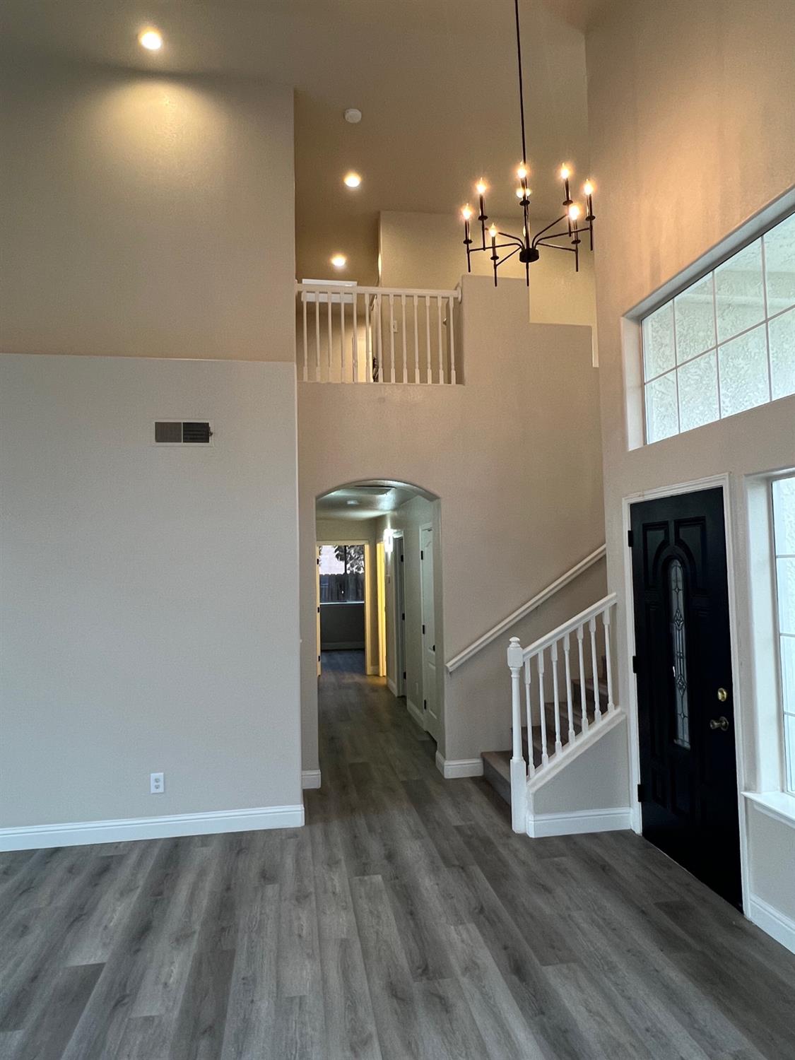 5930 West Birch Avenue Fresno, CA 93722 - Photo 6 of 32 a view of a livingroom with a kitchen