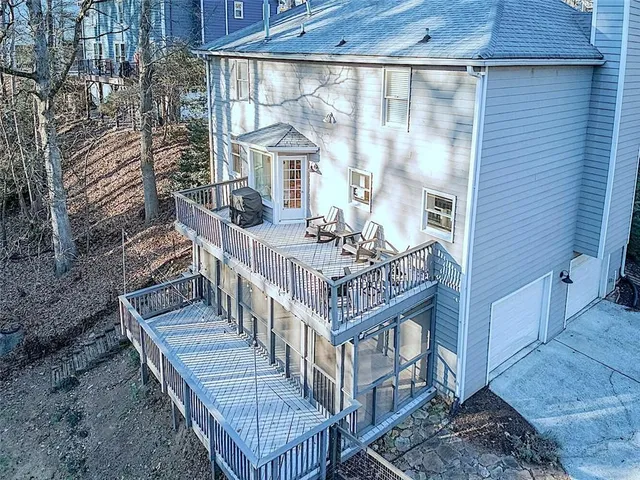 a view of a balcony with chairs