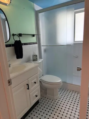 a bathroom with a sink and a toilet