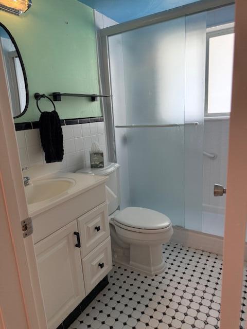 3402 Cynthia Lane, Unit 112 Lake Worth Beach, FL 33461 - Photo 13 of 41 a bathroom with a sink and a toilet