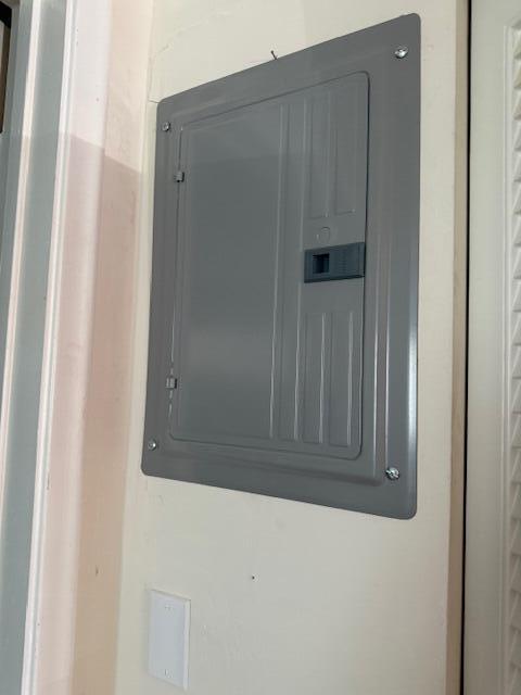 3402 Cynthia Lane, Unit 112 Lake Worth Beach, FL 33461 - Photo 15 of 41 a view of wooden door