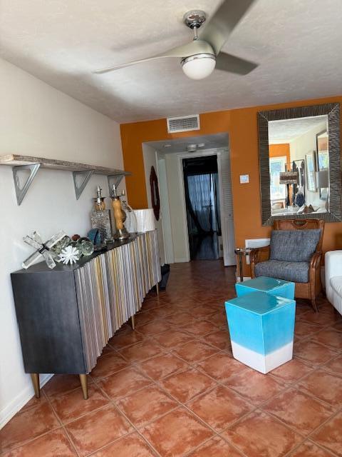 3402 Cynthia Lane, Unit 112 Lake Worth Beach, FL 33461 - Photo 16 of 41 a living room with couches and a dining table with wooden floor