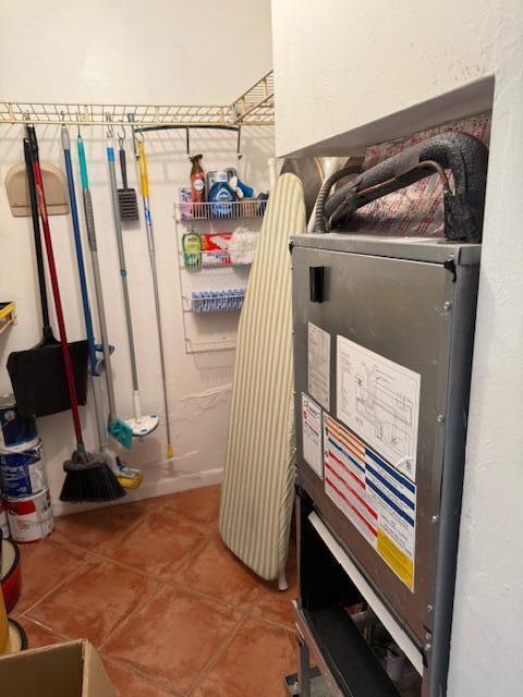 3402 Cynthia Lane, Unit 112 Lake Worth Beach, FL 33461 - Photo 22 of 41 a view of walk in closet with clothes and shoes