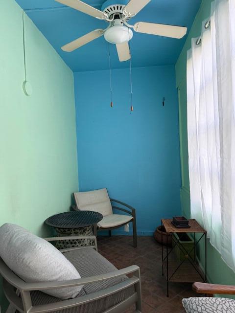 3402 Cynthia Lane, Unit 112 Lake Worth Beach, FL 33461 - Photo 24 of 41 a room with furniture and window