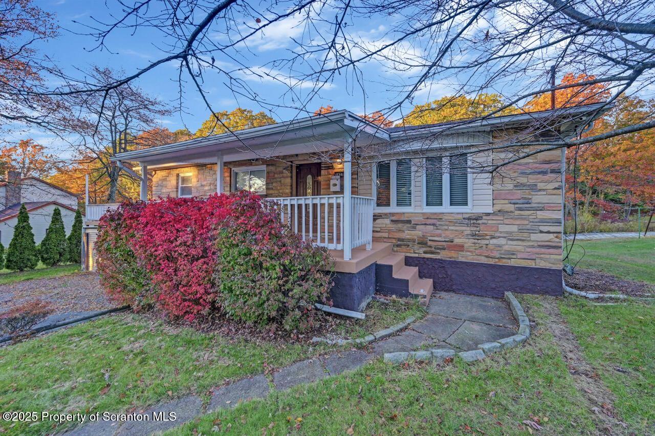 1427 Birch Street Scranton, PA 18505 - Photo 1 of 55 a front view of a house with garden