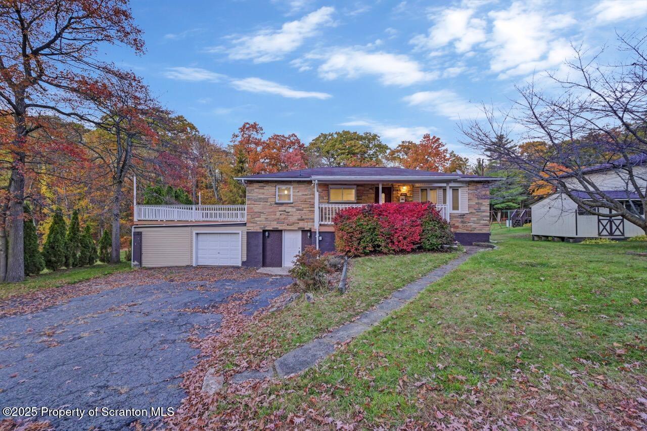 1427 Birch Street Scranton, PA 18505 - Photo 2 of 55 a view of a house with yard and a garden