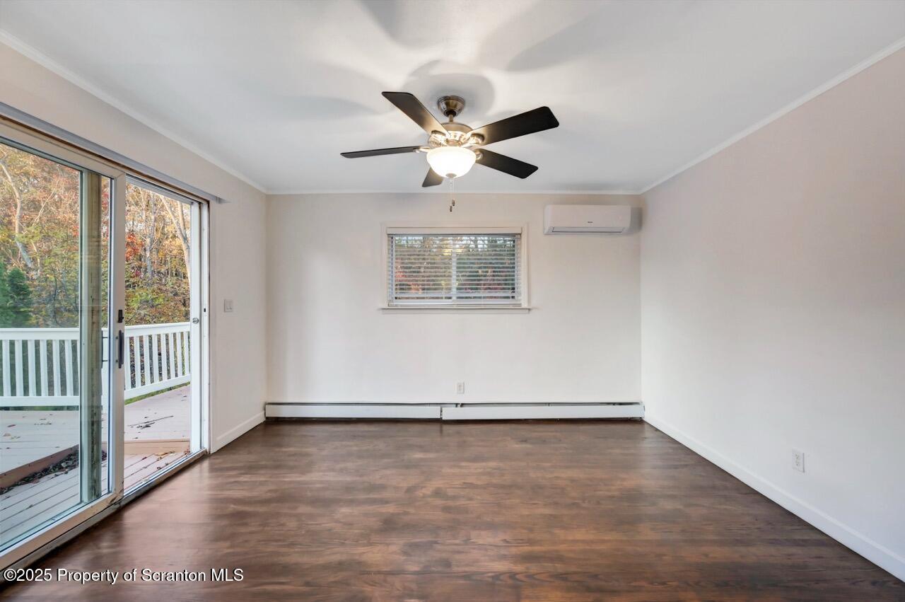 1427 Birch Street Scranton, PA 18505 - Photo 22 of 55 an empty room with wooden floor and windows