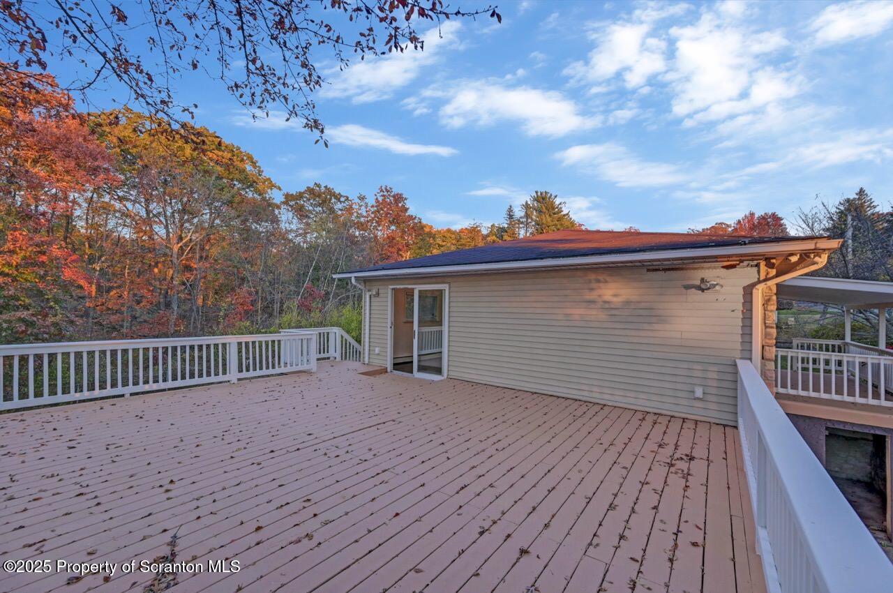 1427 Birch Street Scranton, PA 18505 - Photo 26 of 55 a view of a house with a wooden deck