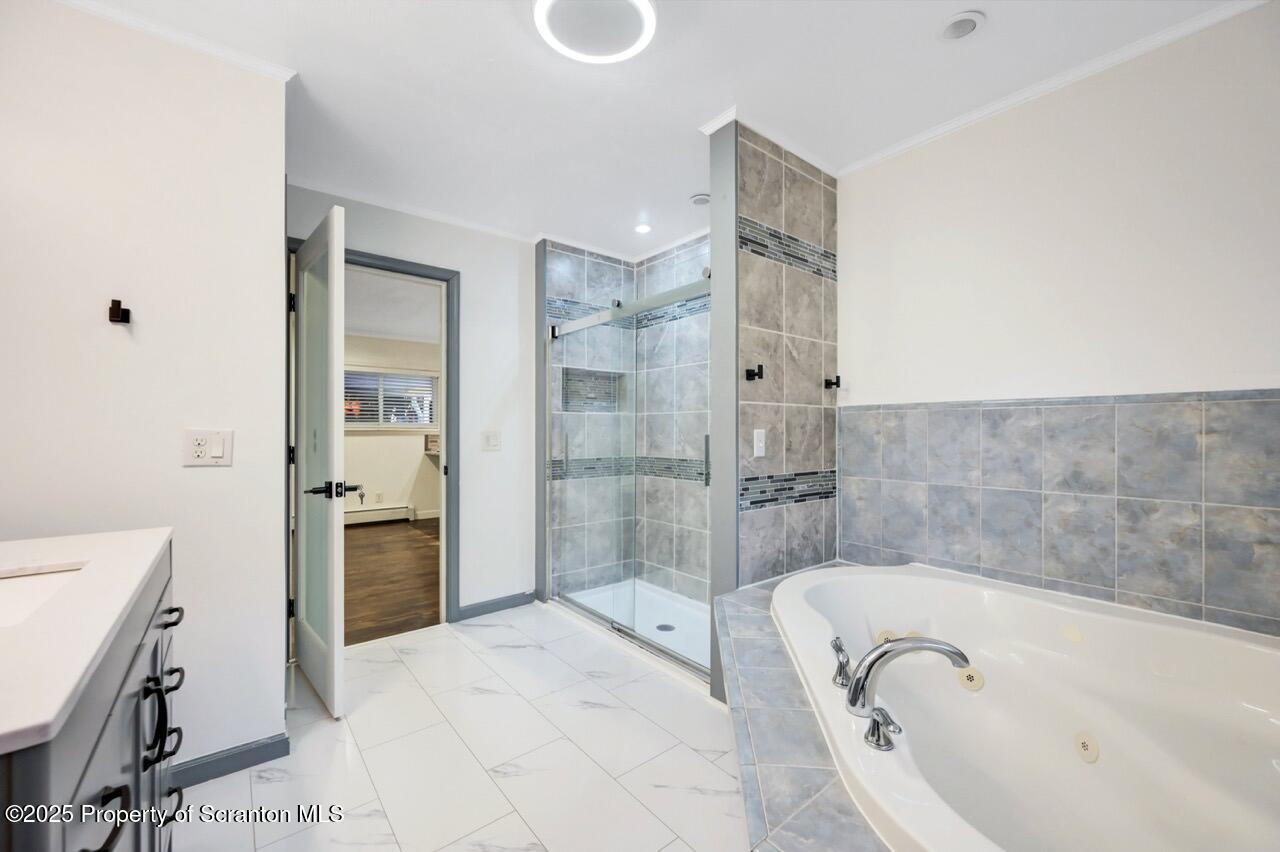 1427 Birch Street Scranton, PA 18505 - Photo 30 of 55 a bathroom with a bathtub and a shower