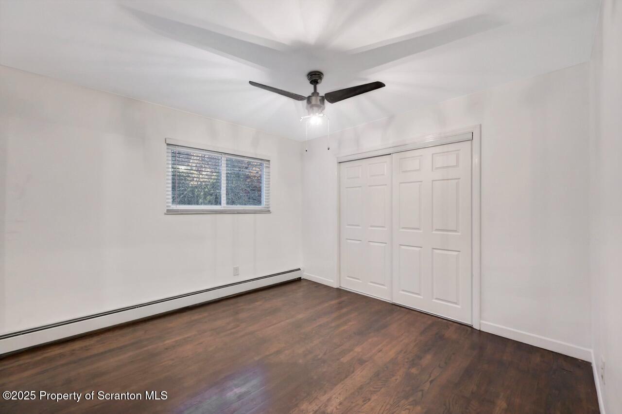 1427 Birch Street Scranton, PA 18505 - Photo 32 of 55 an empty room with a ceiling fan & a window
