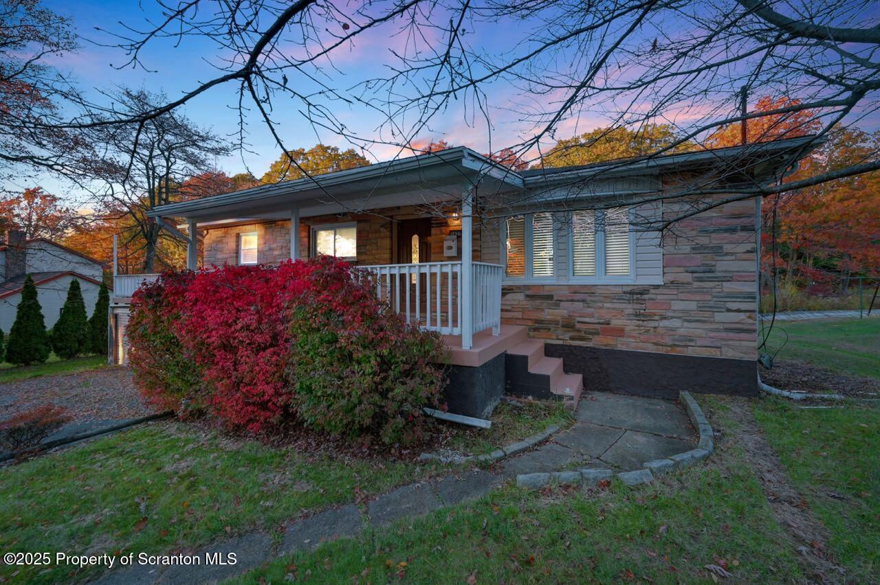 1427 Birch Street Scranton, PA 18505 - Photo 4 of 55 a front view of a house with garden