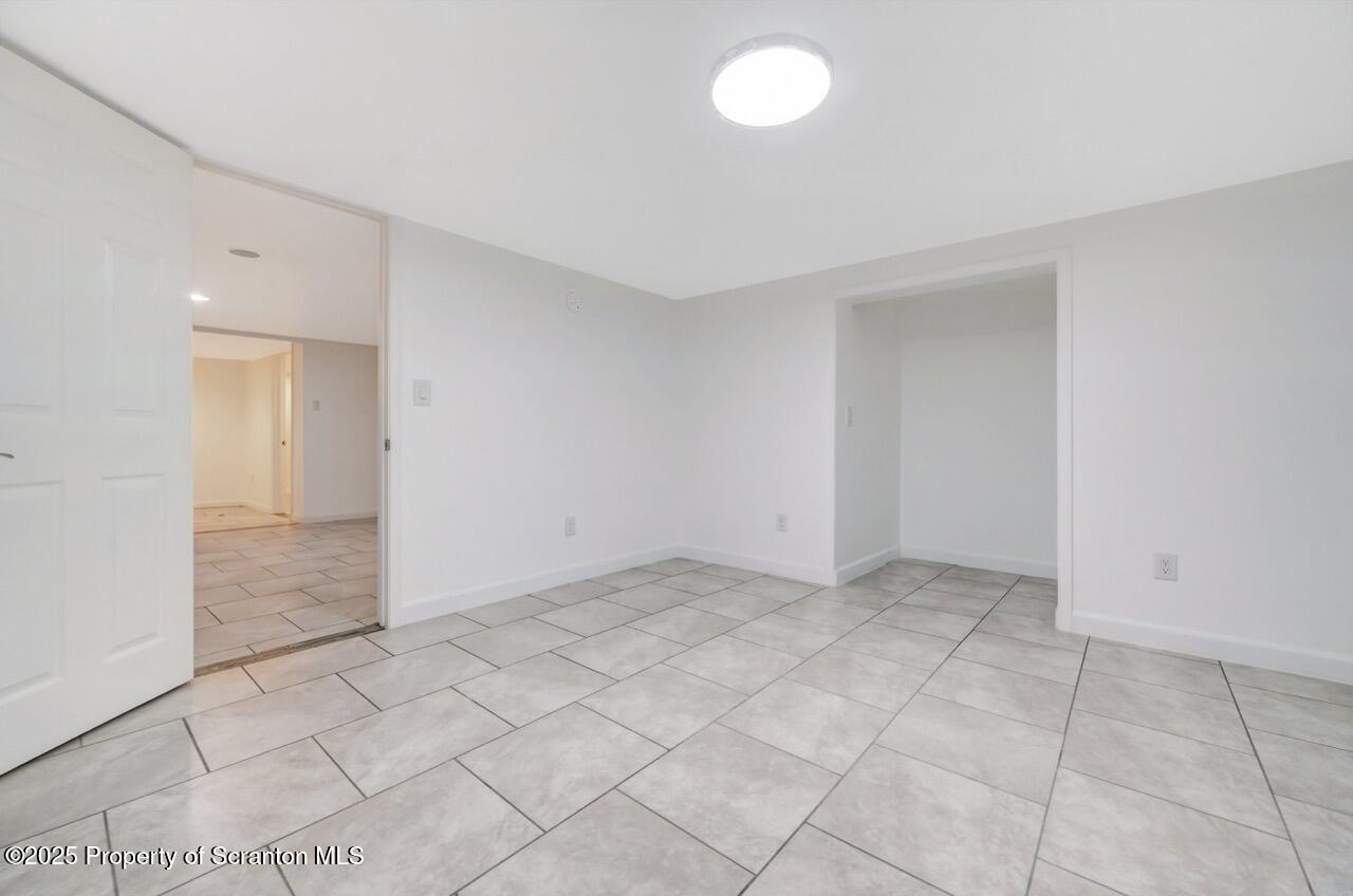 1427 Birch Street Scranton, PA 18505 - Photo 44 of 55 an empty room with white walls