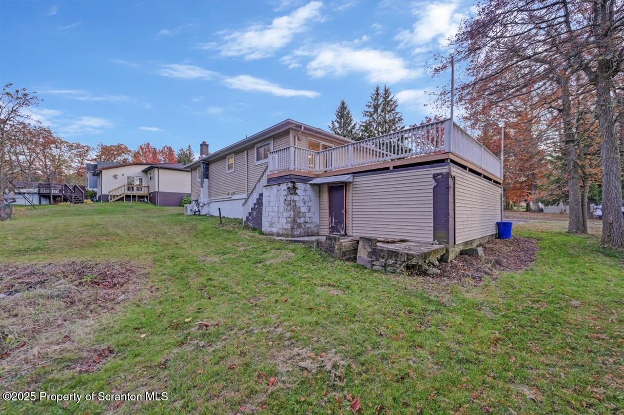 1427 Birch Street Scranton, PA 18505 - Photo 54 of 55 a view of a backyard with a large tree