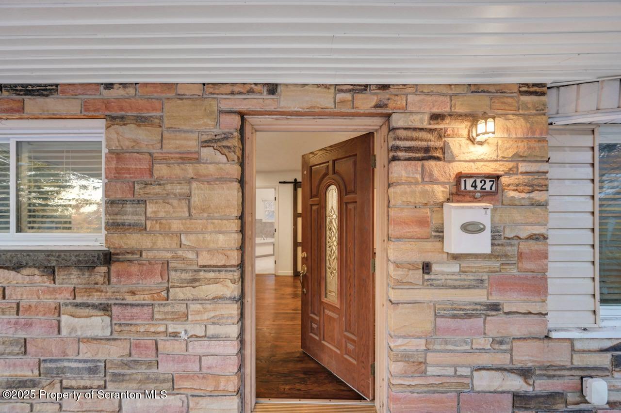 1427 Birch Street Scranton, PA 18505 - Photo 7 of 55 a bathroom with a shower and a mirror