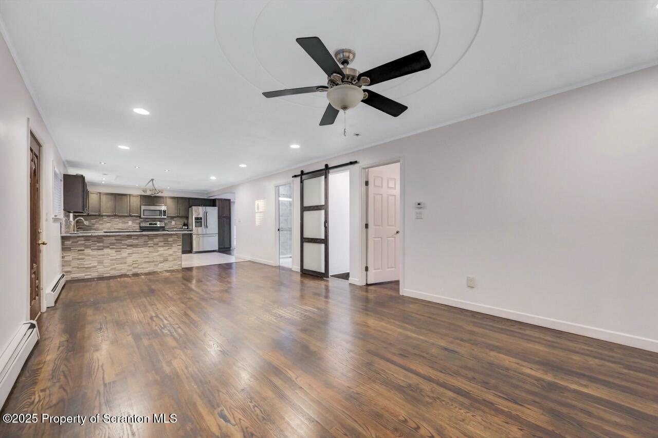 1427 Birch Street Scranton, PA 18505 - Photo 9 of 55 a view of an empty room and kitchen view