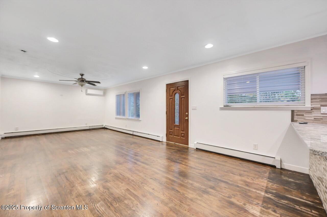 1427 Birch Street Scranton, PA 18505 - Photo 10 of 55 wooden floor in an empty room with a window