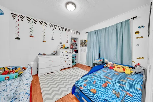 a room with toys and wooden floor