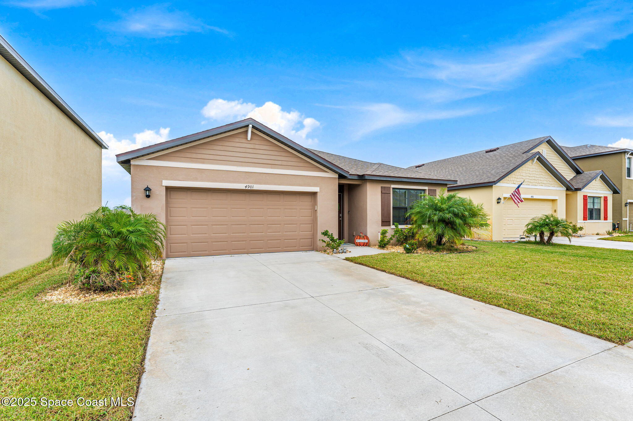 4901 Talbot Boulevard Cocoa, FL 32926 - Photo 2 of 39 a front view of a house with garden