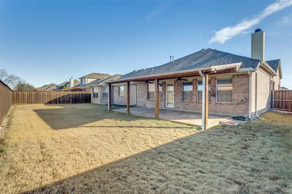 a view of house with swimming pool