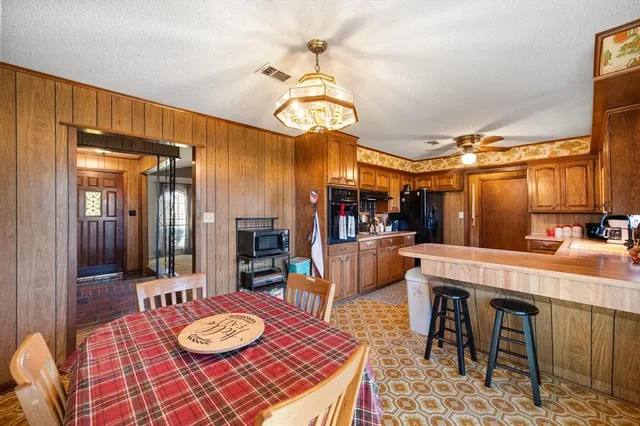 a view of a dining room with furniture