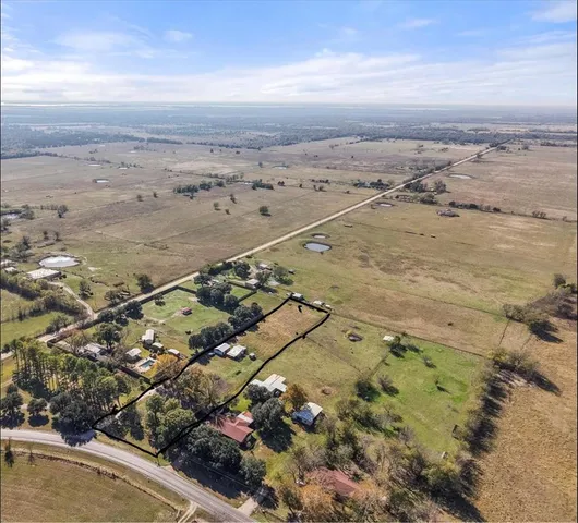 an aerial view of beach and city