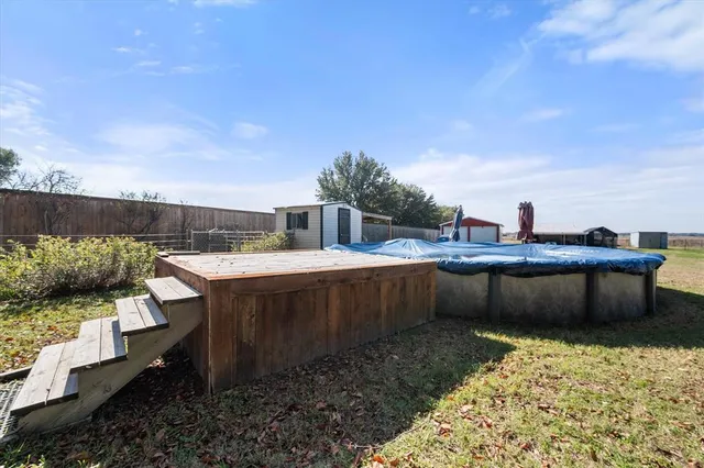 a view of a balcony with chairs