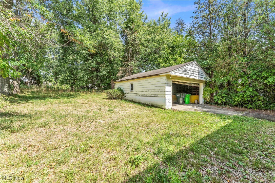 12931 Fruitside Road Garfield Heights, OH 44125 - Photo 15 of 15 View of yard with an outbuilding
