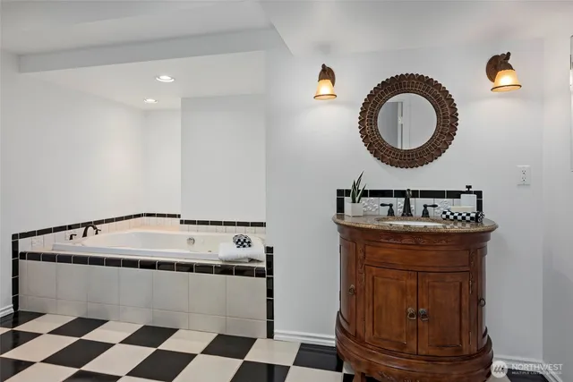 a utility room with a sink a washer and dryer