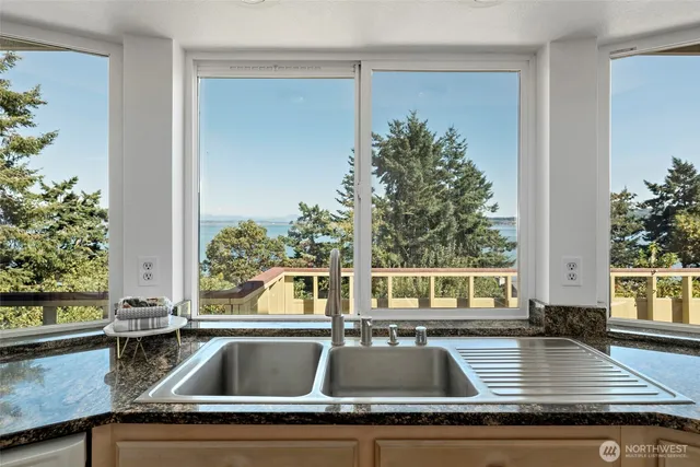 a kitchen with a sink and a window