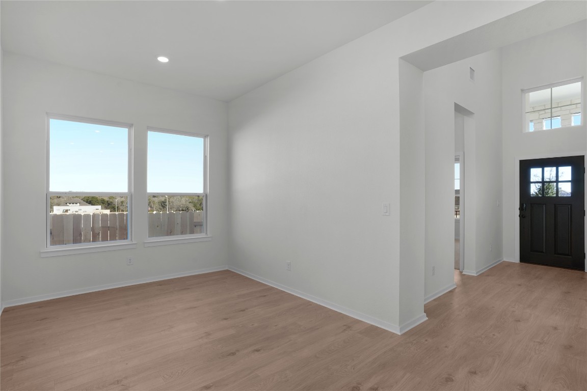 237 Wingstem Way Georgetown, TX 78633 - Photo 28 of 40 an empty room with windows and closet