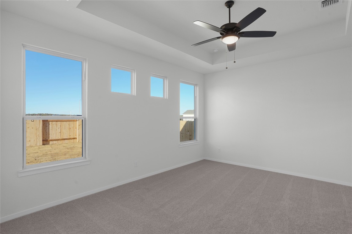 237 Wingstem Way Georgetown, TX 78633 - Photo 32 of 40 an empty room with a window and a fan