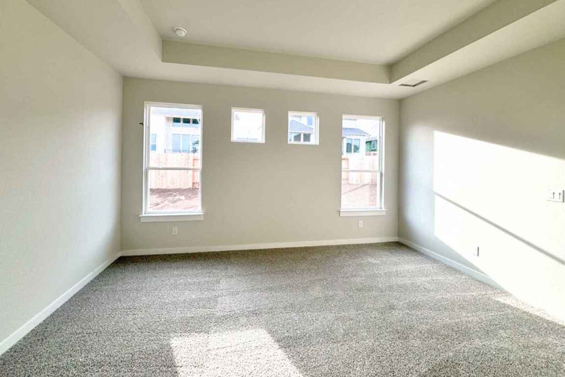 237 Wingstem Way Georgetown, TX 78633 - Photo 5 of 40 a view of an empty room with a window