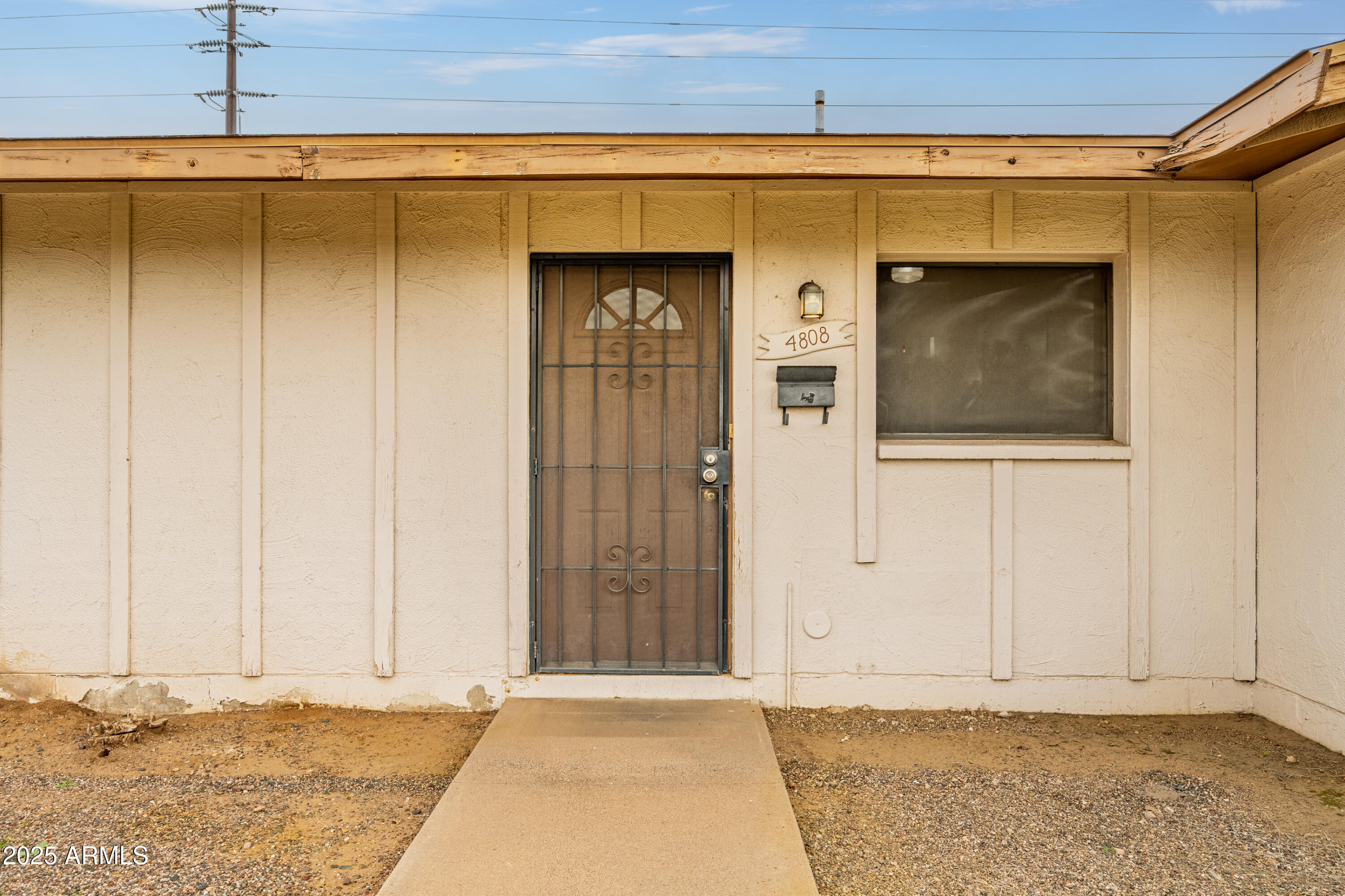 4808 North 71st Lane Phoenix, AZ 85033 - Photo 2 of 20 a view of a door