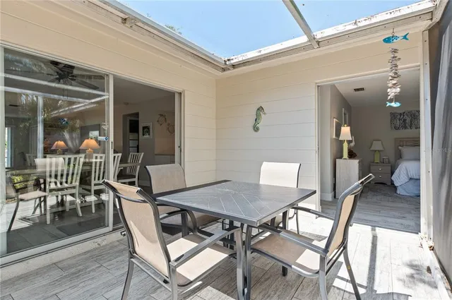 an aerial view of a city with ocean view