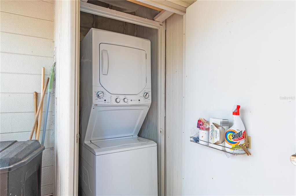 6005 Midnight Pass Road, Unit S4 Sarasota, FL 34242 - Photo 34 of 34 a utility room with a washer and dryer