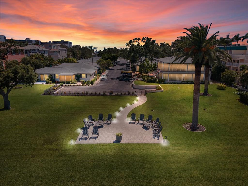 6005 Midnight Pass Road, Unit S4 Sarasota, FL 34242 - Photo 4 of 34 a view of a lake with a building in the background