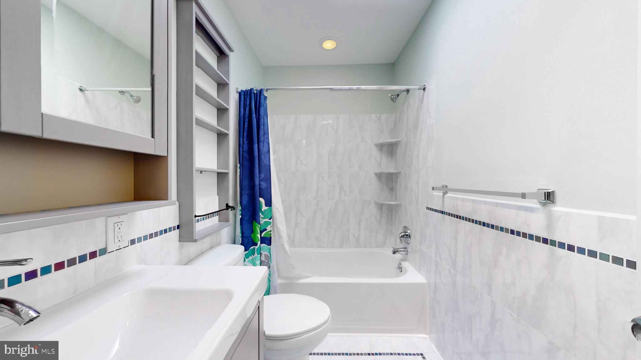 5142 Ranstead Street Philadelphia, PA 19139 - Photo 10 of 16 a bathroom with a sink toilet and shower