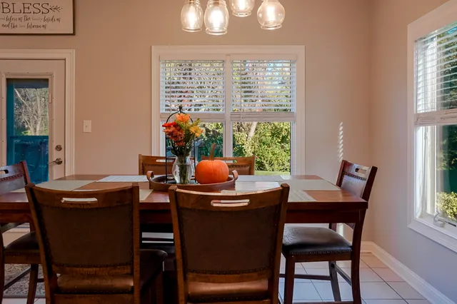 a bathroom with a sink a vanity and a mirror