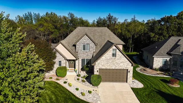 a living room with a couch and a large window