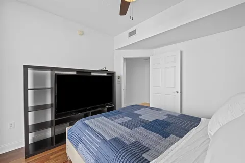 a bathroom with a shower and a sink