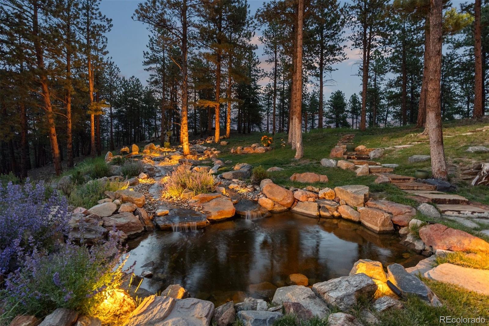 2929 Highlands View Road Evergreen, CO 80439 - Photo 42 of 50 a view of swimming pool and lake view