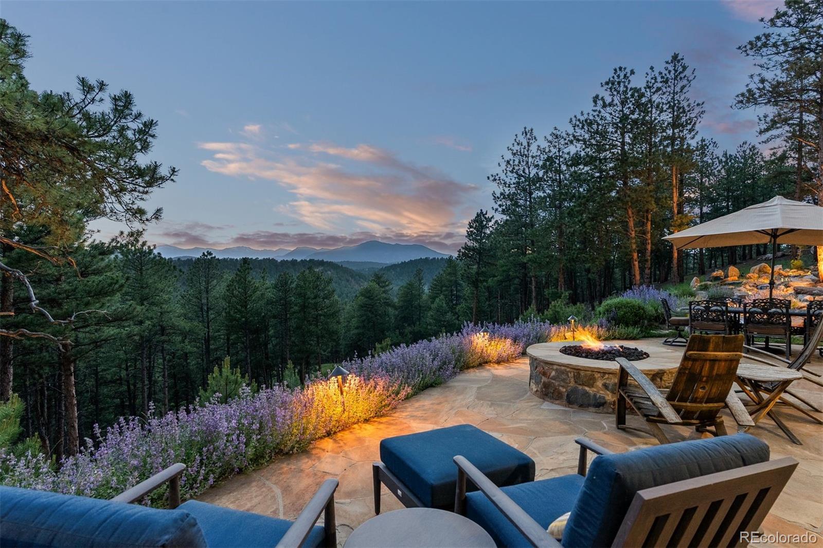 2929 Highlands View Road Evergreen, CO 80439 - Photo 44 of 50 an outdoor space with patio furniture