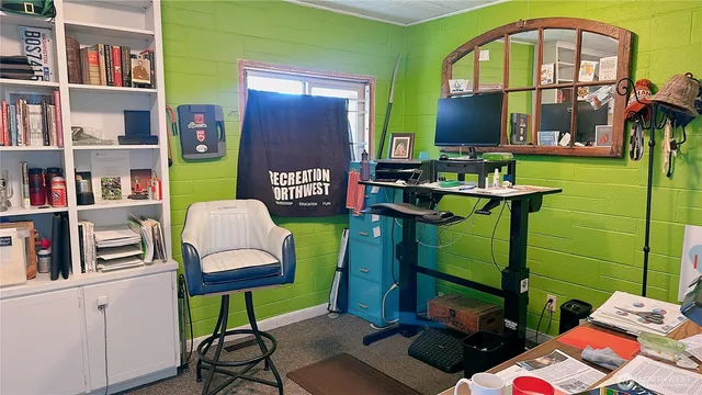 a view of kitchen with stainless steel appliances granite countertop a sink and a stove top oven